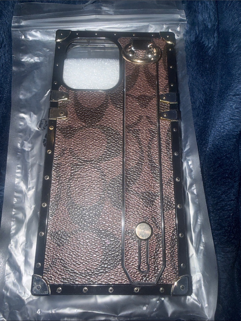 Brown Textured Trunk-Style iPhone Case with Gold Hardware